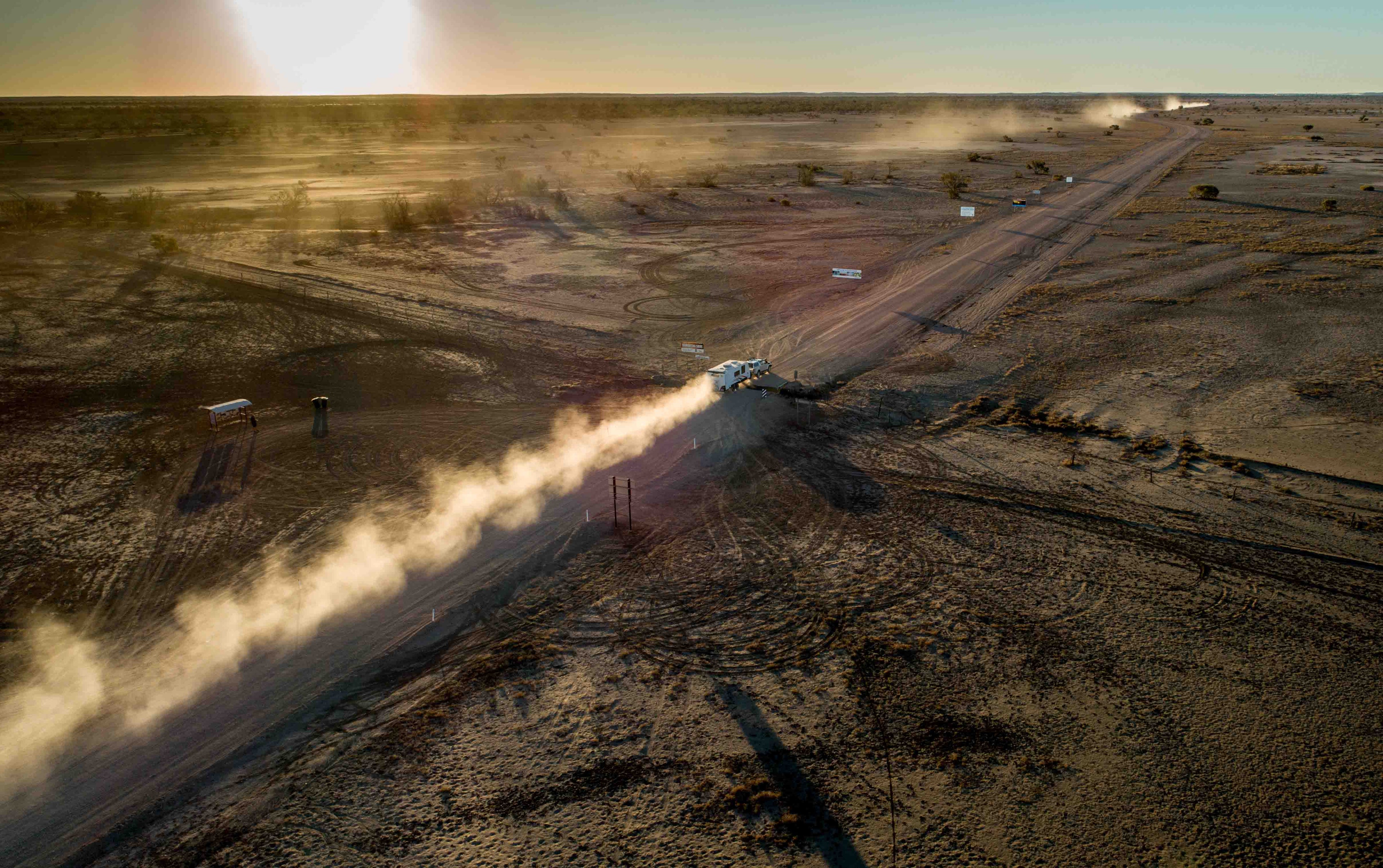 drone shot of caravan being towed in the Australian outback 